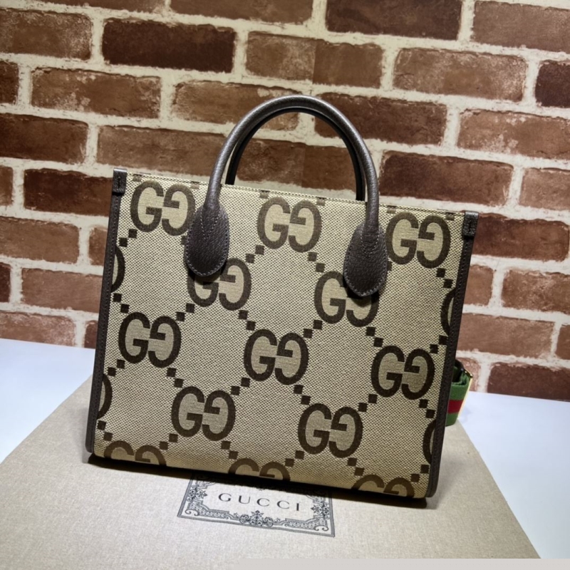 G*u*i shopping bags